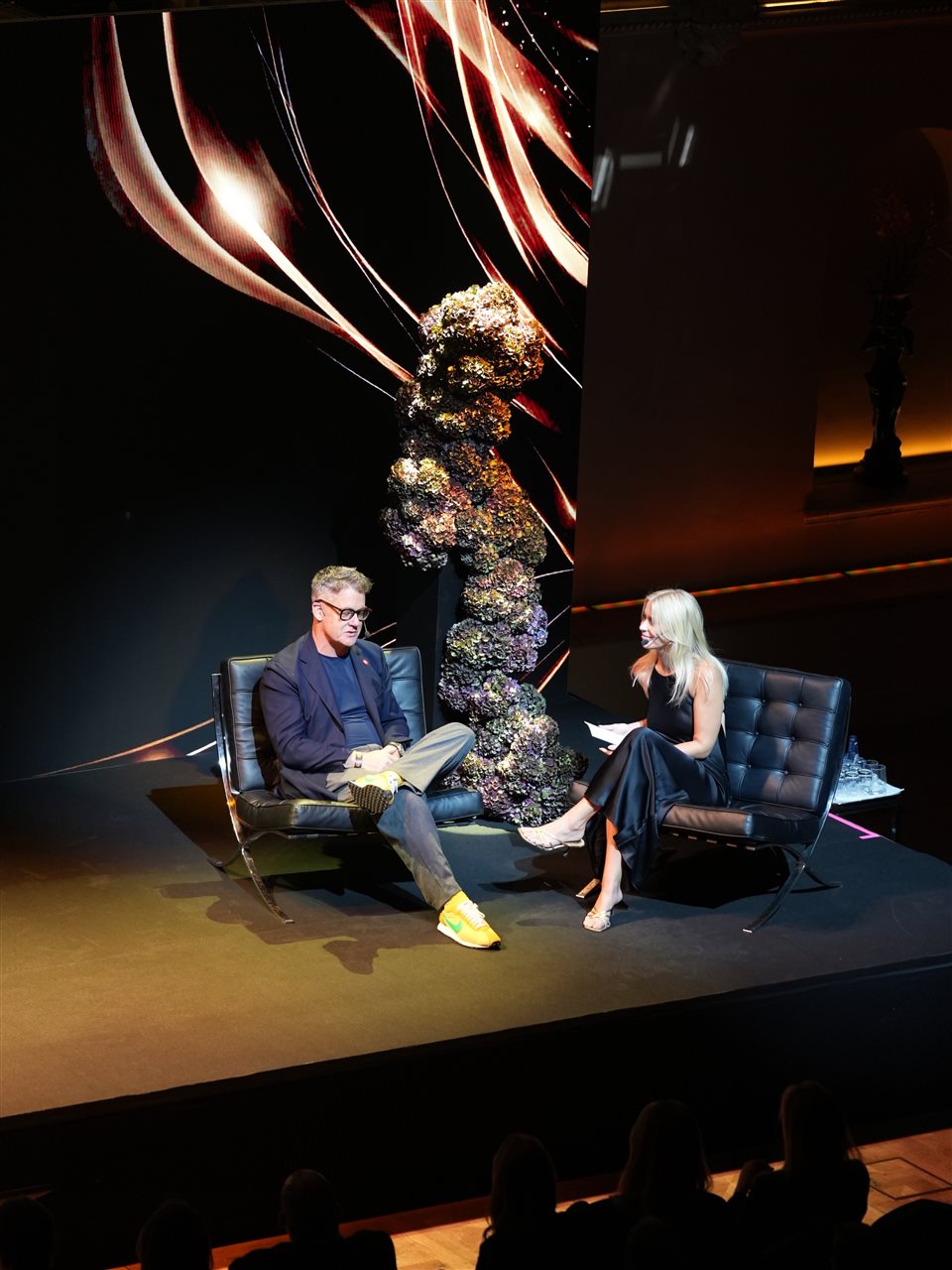 Publicis 100-year celebration — on-stage conversation framed by LED visuals