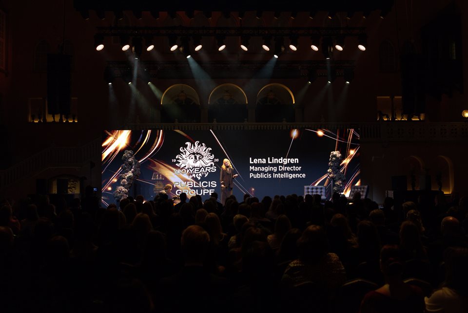 Publicis 100-year celebration — wide view of the presentation stage and audience